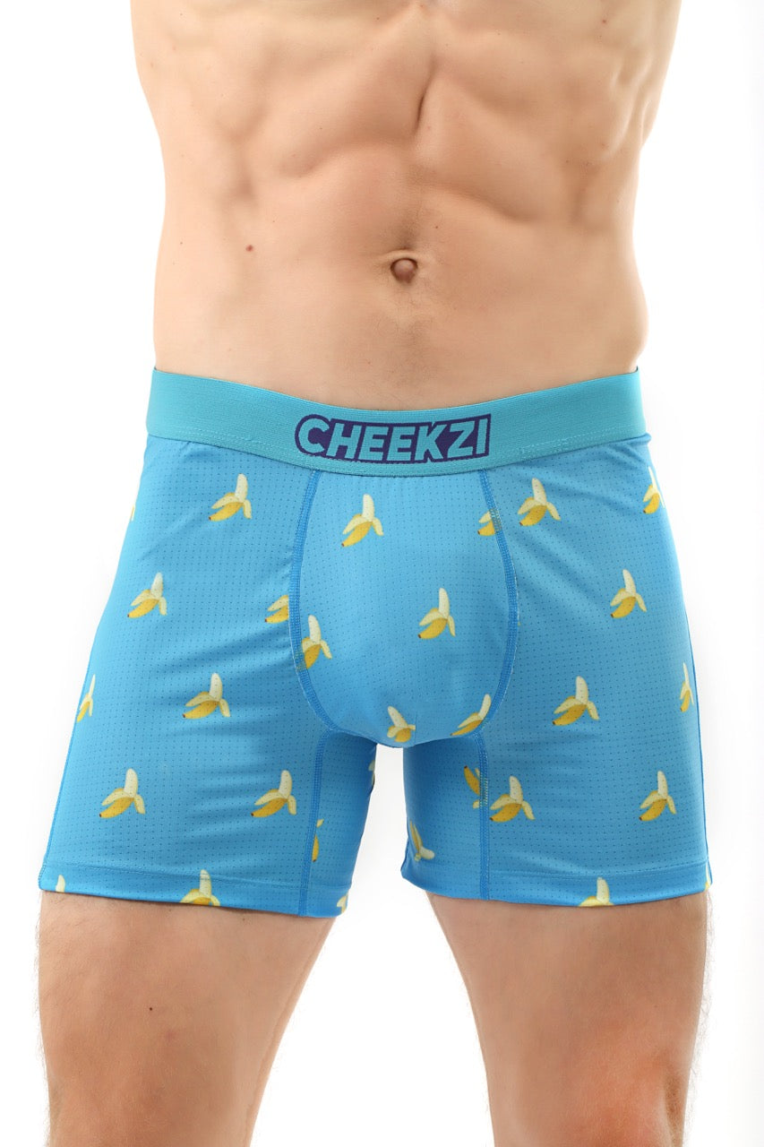 "Sky blue men’s briefs with playful banana print, offering comfort and a cheeky design for everyday wear.