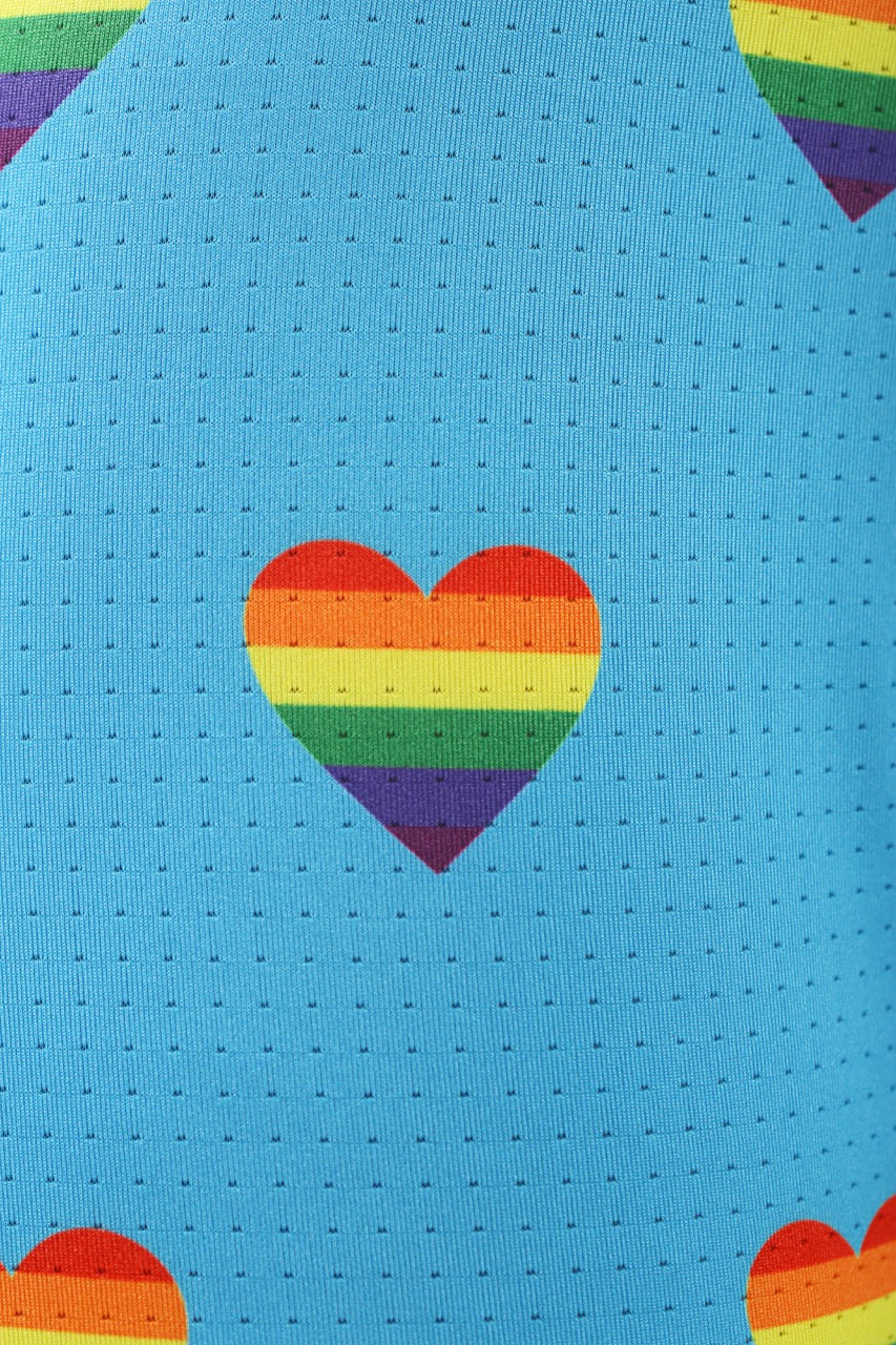 Sky blue men’s briefs with colorful rainbow heart print, offering inclusive style with soft, comfortable fabric.