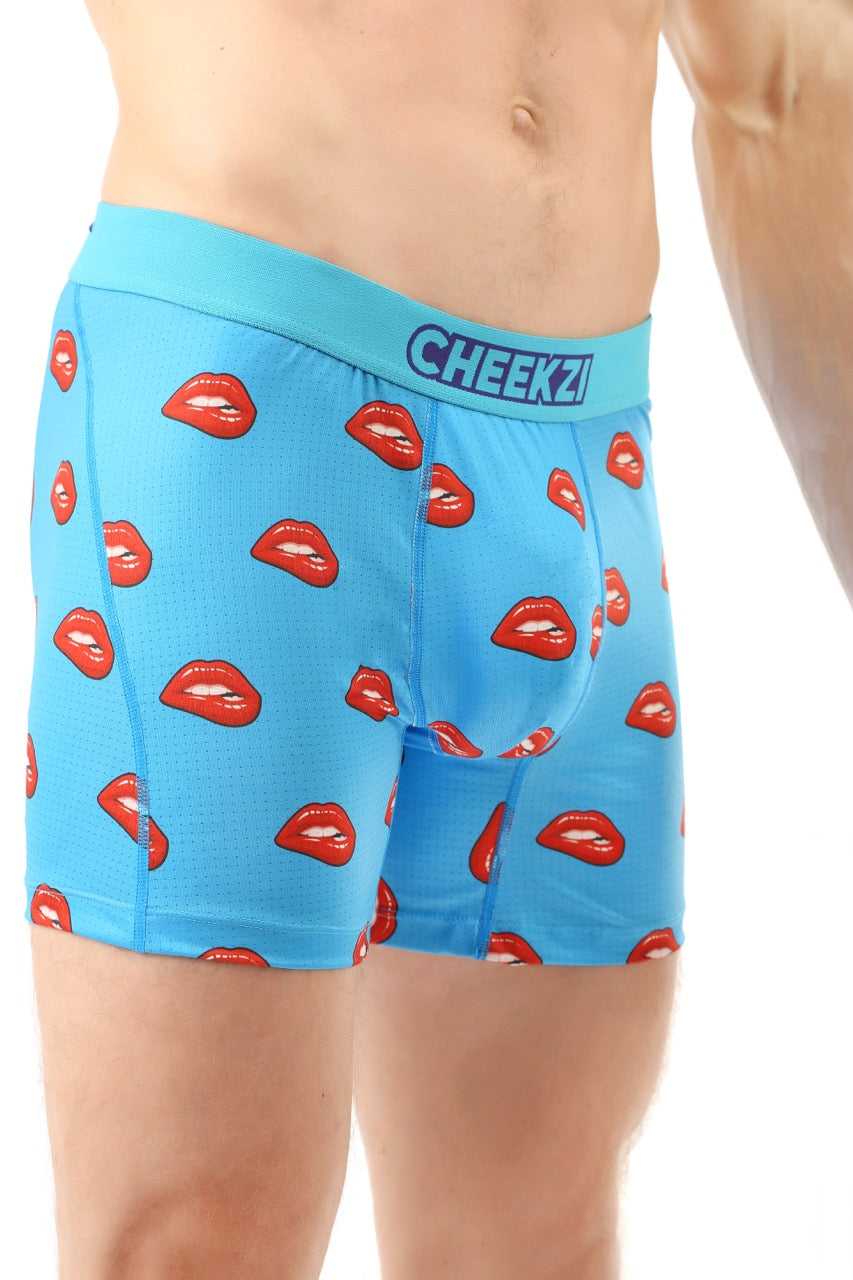 Sky blue underwear featuring bold red lip print, playful and soft fabric for a cheeky and comfortable fit.
